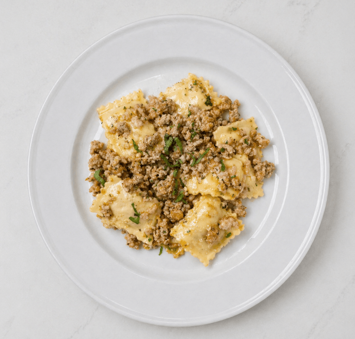 Ravioli En Brodo with Chicken Sausage